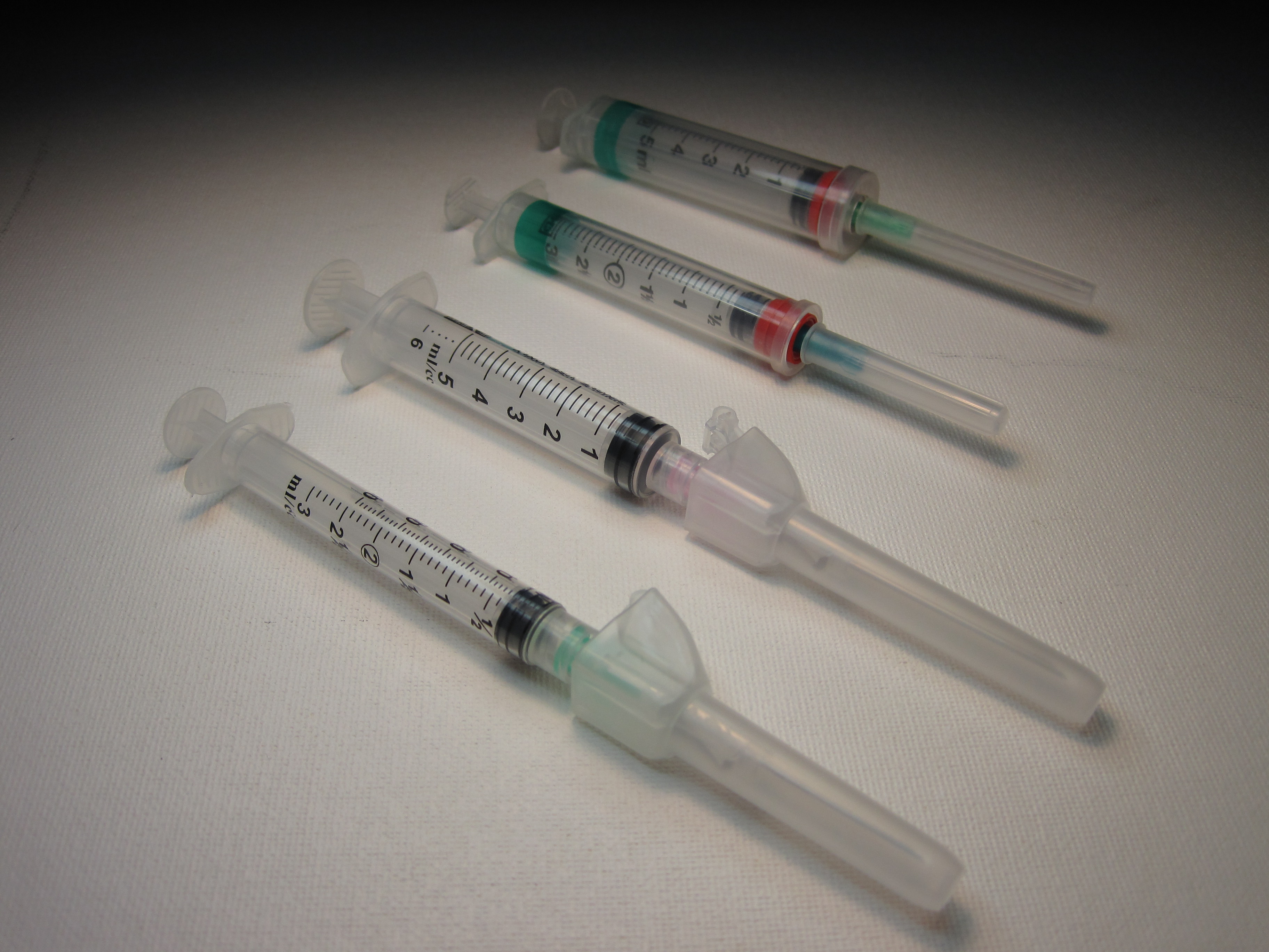 Sterile medical syringes with needles used for in-office injections